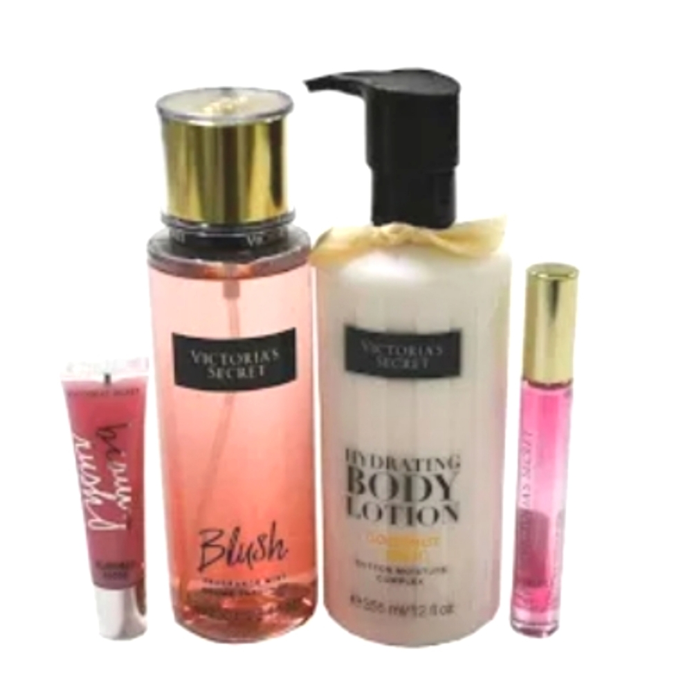 NWT, Victoria's Secret 4 pice gift set body mist, lotion, lip gloss and perfume